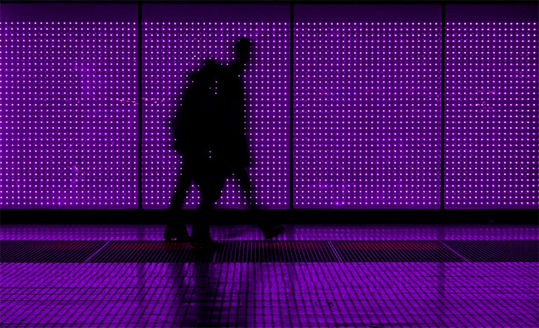 Couple walking in led panel